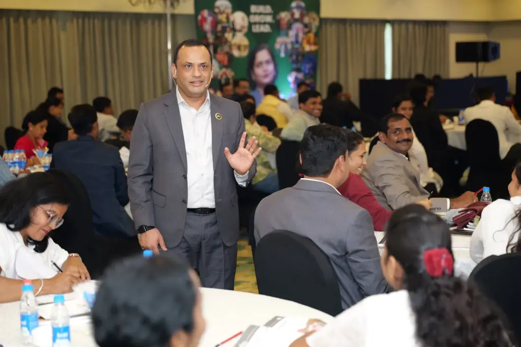 Owners taking notes as Dilip Auti explains